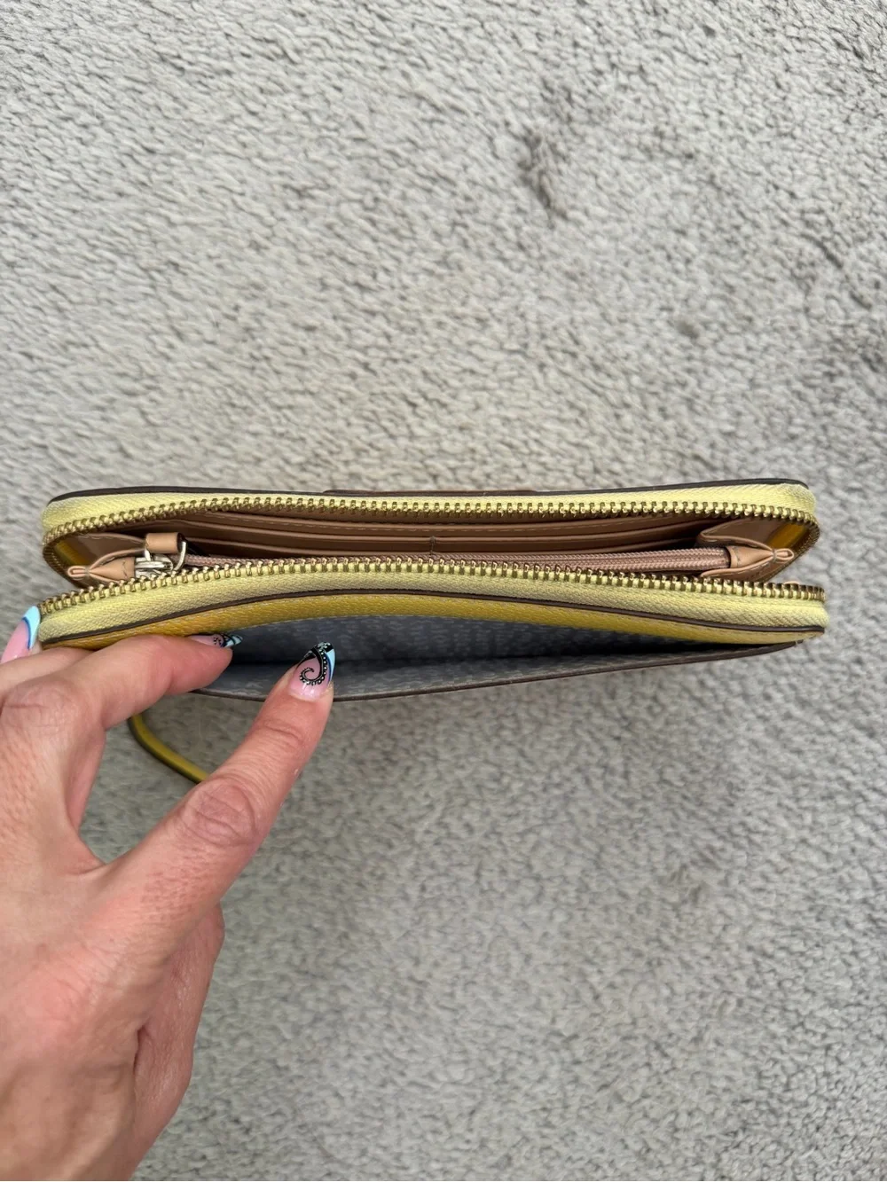 kate spade bright yellow zip-around wallet